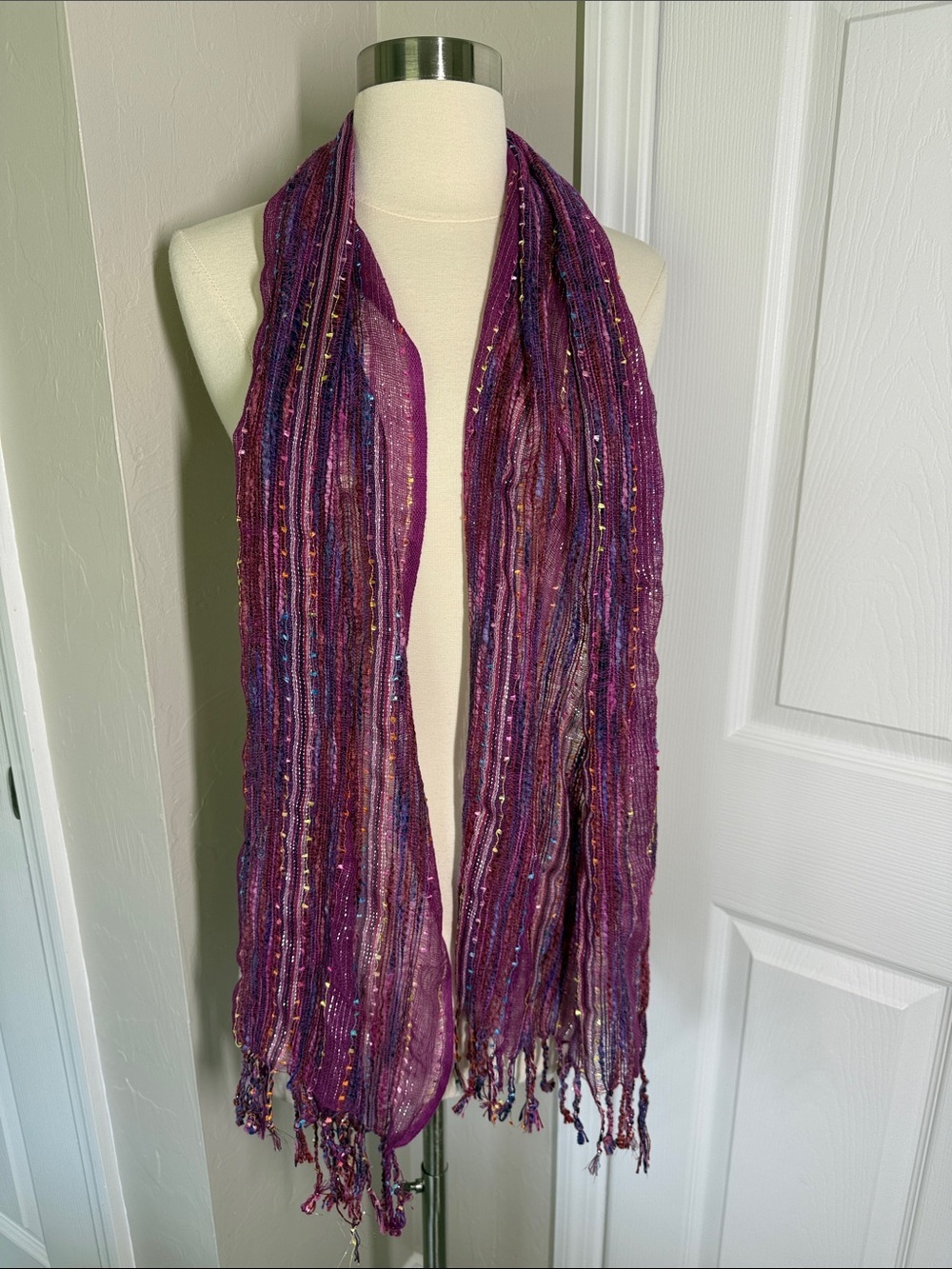 Woven pink and purple scarf with fringe